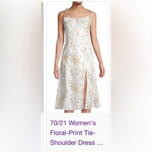 A fresh floral print blooms on this dress.